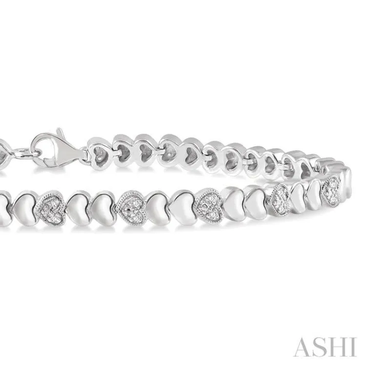 1/6 Ctw Puffed Heart Plain and Round Cut Diamond Fashion Bracelet in Sterling Silver