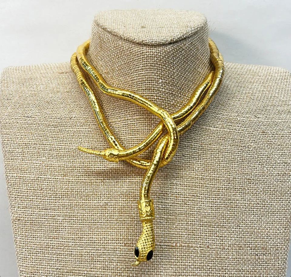 80’s sculptural style gold metal omega look that can be twisted and shaped into a necklace