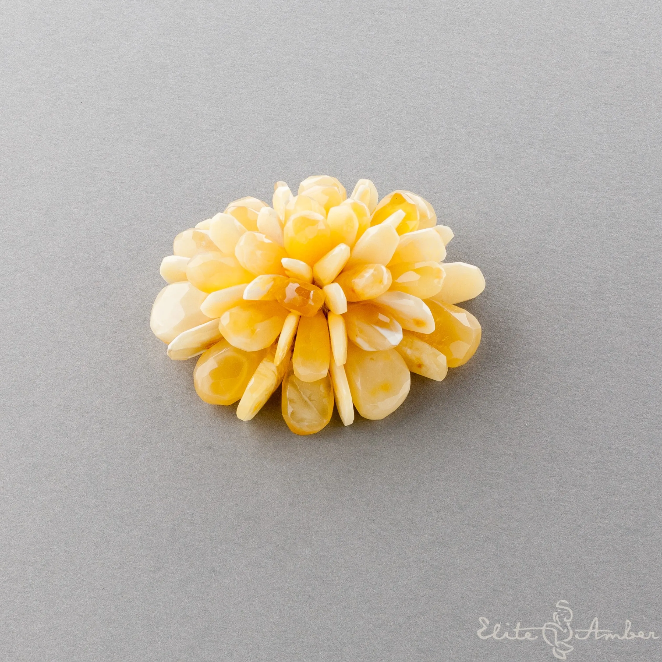 Amber brooch-pendant "Royal white flower"