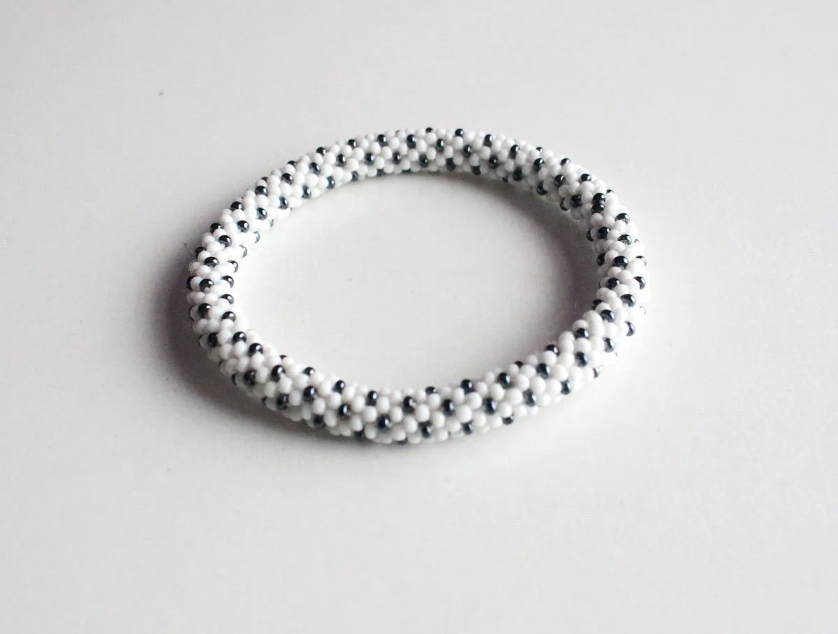 Black On White Beads Roll On Bracelet