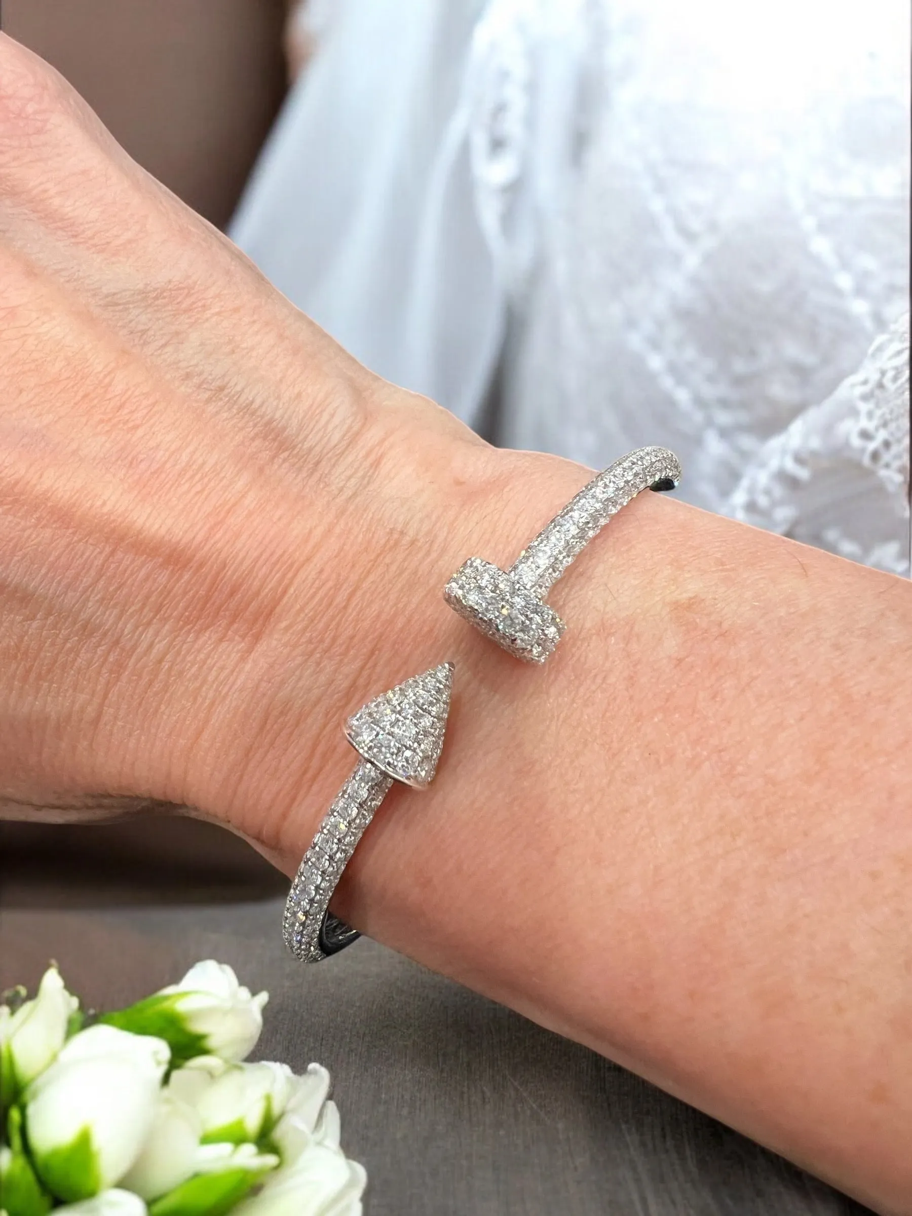 diamond pave nail and arrow bracelet