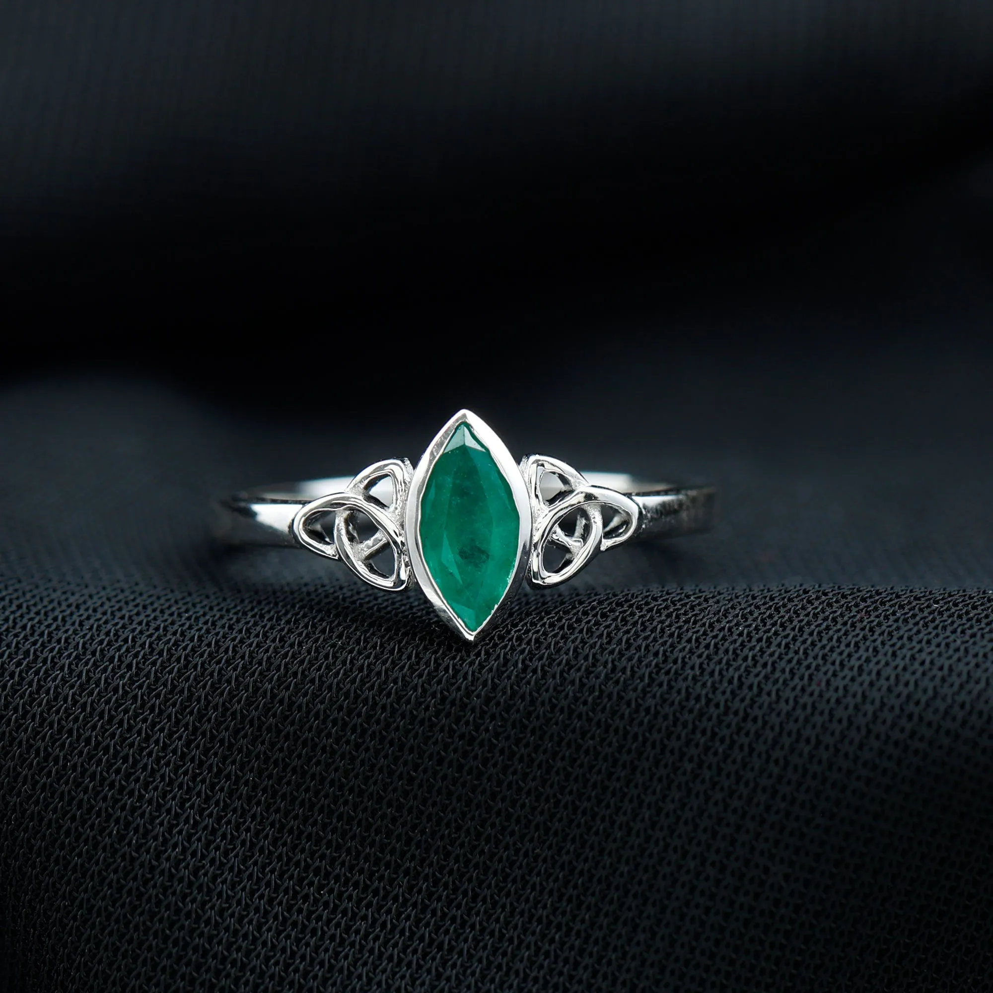 Marquise Cut Emerald Solitaire Celtic Ring in Bezel Setting